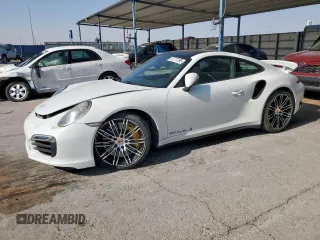 2014 Porsche 911 Turbo S z VIN WP0AD2A96ES167671, wystawiony jako Copart lot #57777395 z przebiegiem 16 029 mil mil oraz Szkoda całkowita • Salvage title. Historia ofert i sprzedaży dostępna na DreamBid. Obrazek 1.