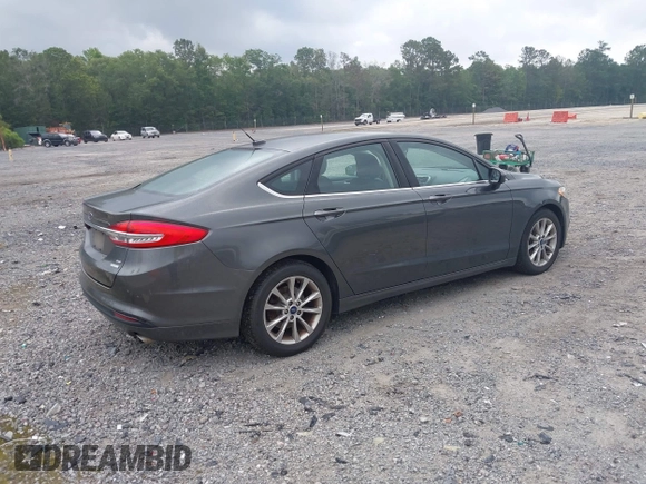 2017 Ford Fusion SE z VIN 3FA6P0HD6HR174945, wystawiony jako IAAI lot #42416548 z przebiegiem 128 410 mil mil oraz . Historia ofert i sprzedaży dostępna na DreamBid. Obrazek 4.