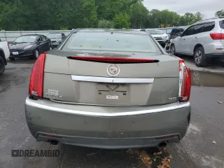 2010 Cadillac CTS Premium with VIN 1G6DS5EV3A0116911, listed as a Copart auction lot 57394905 with 126,084 mi miles and Salvage title. Bid and sale history available at DreamBid. Image 6.