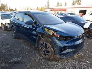 2023 Volkswagen ID.4 Pro z VIN 1V2DNPE81PC017620, wystawiony jako IAAI lot #41573053 z przebiegiem 15 462 mil mil oraz . Historia ofert i sprzedaży dostępna na DreamBid. Obrazek 1.