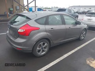 2014 Ford Focus SE with VIN 1FADP3K21EL462169, listed as a IAAI auction lot 42145524 with 100,156 mi miles. Bid and sale history available at carsss.com. Image 4.