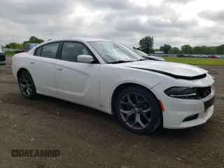 2015 Dodge Charger SXT with VIN 2C3CDXHG4FH832400, listed as a Copart auction lot 61493795 with 134,582 mi miles and Salvage title. Bid and sale history available at DreamBid. Image 4.