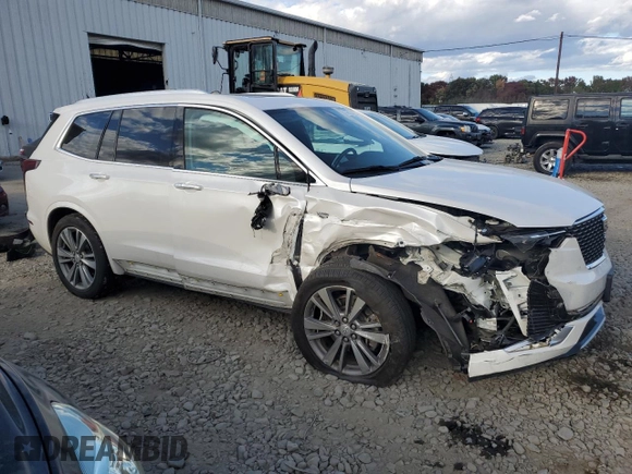 2020 Cadillac XT6 FWD Premium Luxury with VIN 1GYKPCRS2LZ138465, listed as a Copart auction lot 76114034 with 57,353 mi miles and Salvage Title. Bid and sale history available at carsss.com. Image 4.