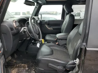 2017 Jeep Wrangler Sahara z VIN 1C4AJWBG5HL542123, wystawiony jako Copart lot #49315805 z przebiegiem 149 941 mil mil oraz Szkoda całkowita • Salvage title. Historia ofert i sprzedaży dostępna na DreamBid. Obrazek 7.