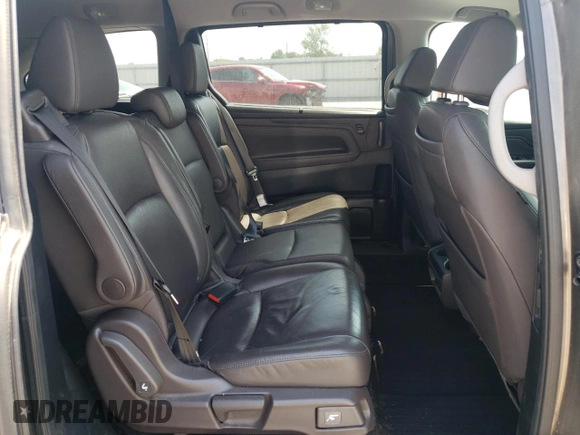 2019 Honda Odyssey Touring z VIN 5FNRL6H87KB098010, wystawiony jako Copart lot #54791505 z przebiegiem 94 477 mil mil oraz Szkoda całkowita • Salvage title. Historia ofert i sprzedaży dostępna na DreamBid. Obrazek 11.