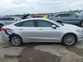 2017 Ford Fusion SE with VIN 3FA6P0HD3HR273593, listed as a IAAI auction lot 42136079 with 101,545 mi miles and . Bid and sale history available at DreamBid. Image 13.