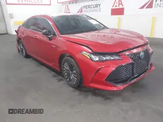 2021 Toyota Avalon Hybrid XSE z VIN 4T1EA1AB2MU004456, wystawiony jako IAAI lot #41060997 z przebiegiem 29 594 mil mil oraz . Historia ofert i sprzedaży dostępna na DreamBid. Obrazek 1.