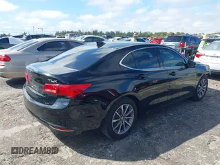 2020 Acura TLX w/Technology Pkg with VIN 19UUB1F57LA016345, listed as a IAAI auction lot 41661004 with 66,501 mi miles. Bid and sale history available at carsss.com. Image 4.