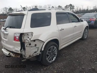 2012 GMC Acadia Denali with VIN 1GKKVTED0CJ308196, listed as a IAAI auction lot 42027791 with 150,740 mi miles and . Bid and sale history available at carsss.com. Image 4.