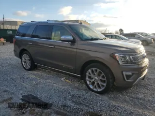 2019 Ford Expedition Platinum with VIN 1FMJU1LTXKEA56503, listed as a Copart auction lot 45657785 with 104,839 mi miles and Salvage Title. Bid and sale history available at carsss.com. Image 4.