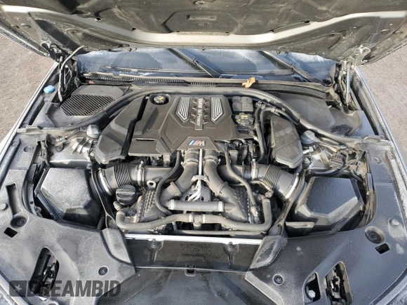 2018 BMW M5 z VIN WBSJF0C56JB282184, wystawiony jako Copart lot #87480414 z przebiegiem Nie podano mil oraz Szkody całkowita. Historia ofert i sprzedaży dostępna na DreamBid. Obrazek 11.