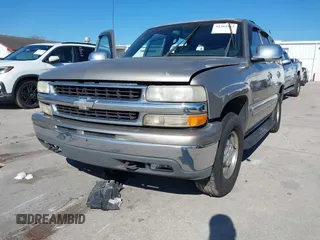 2001 Chevrolet Tahoe LS z VIN 1GNEC13T21J303213, wystawiony jako IAAI lot #41363563 z przebiegiem 194 243 mil mil oraz . Historia ofert i sprzedaży dostępna na DreamBid. Obrazek 12.