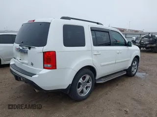 2014 Honda Pilot EX-L with VIN 5FNYF3H73EB024368, listed as a IAAI auction lot 41646002 with 157,336 mi miles and . Bid and sale history available at carsss.com. Image 4.