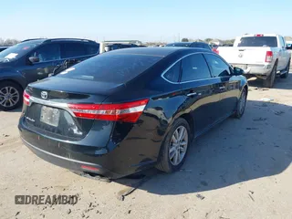 2013 Toyota Avalon XLE with VIN 4T1BK1EB2DU044496, listed as a IAAI auction lot 41573509 with 214,879 mi miles and . Bid and sale history available at DreamBid. Image 4.