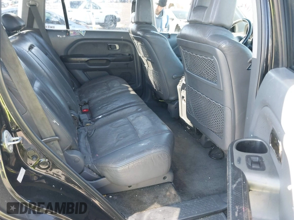 2003 Honda Pilot EX z VIN 2HKYF18713H612854, wystawiony jako IAAI lot #41344126 z przebiegiem 152 331 mil mil oraz . Historia ofert i sprzedaży dostępna na DreamBid. Obrazek 8.