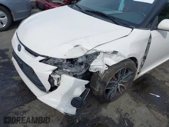 2014 Scion tC z VIN JTKJF5C77E3082073, wystawiony jako IAAI lot #42107615 z przebiegiem 223 895 mil mil oraz . Historia ofert i sprzedaży dostępna na DreamBid. Obrazek 6.