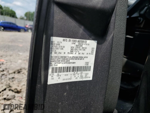 2014 Ford F-150 XL with VIN 1FTMF1CM7EKE51281, listed as a Copart auction lot 62495405 with Not provided miles and Salvage title. Bid and sale history available at DreamBid. Image 12.