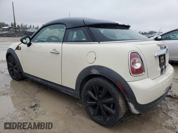 2014 MINI Cooper Coupe with VIN WMWSX1C53ET507947, listed as a Copart auction lot 42087585 with 113,068 mi miles and Salvage Title. Bid and sale history available at carsss.com. Image 2.