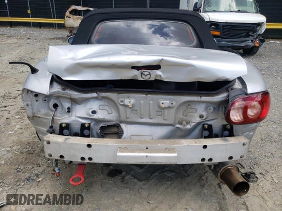 2004 Mazda MX-5 Miata LS with VIN JM1NB353640400140, listed as a Copart auction lot 56127165 with 123,276 mi miles and Salvage title. Bid and sale history available at DreamBid. Image 6.
