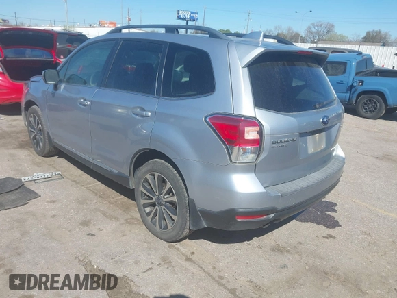 2017 Subaru Forester Touring with VIN JF2SJGTC9HH409665, listed as a IAAI auction lot 41749546 with 118,635 mi miles. Bid and sale history available at carsss.com. Image 3.
