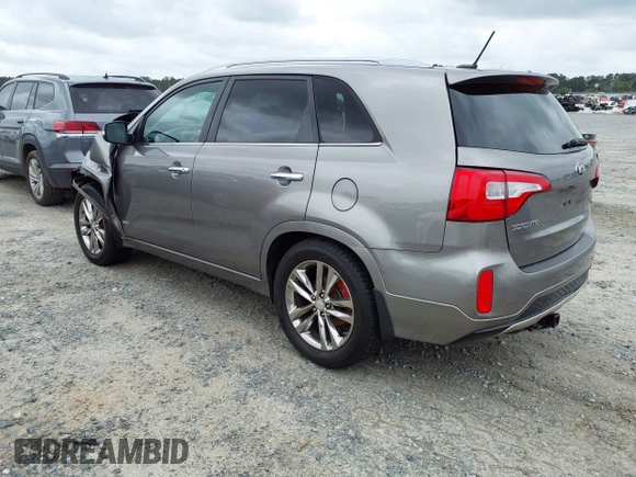 2014 Kia Sorento SX with VIN 5XYKWDA79EG440486, listed as a IAAI auction lot 41918486 with 167,288 mi miles and . Bid and sale history available at DreamBid. Image 3.
