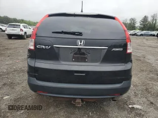 2014 Honda CR-V EX z VIN 2HKRM4H59EH702086, wystawiony jako Copart lot #57152195 z przebiegiem 92 066 mil mil oraz Szkoda całkowita • Salvage title. Historia ofert i sprzedaży dostępna na DreamBid. Obrazek 6.