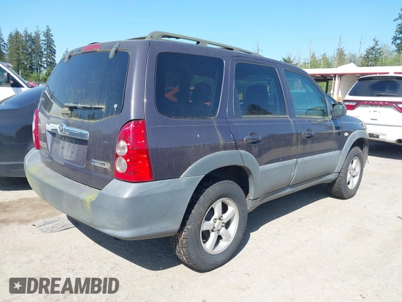 2006 Mazda Tribute i with VIN 4F2YZ02Z16KM00215, listed as a IAAI auction lot 42153919 with 272,828 mi miles and . Bid and sale history available at carsss.com. Image 4.