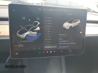 2024 Tesla Model Y Long Range с VIN 7SAYGDEE6RF157415, выставлен на аукционе Copart как лот 54950915 с пробегом 20 567 миль миль и Списание • Salvage title. История ставок и продаж доступна на DreamBid. Изображение 9.
