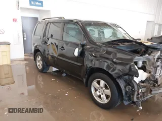 2011 Honda Pilot EX with VIN 5FNYF3H48BB055911, listed as a IAAI auction lot 41364335 with 165,445 mi miles and . Bid and sale history available at carsss.com. Image 13.