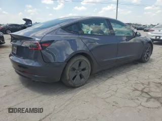 2023 Tesla Model 3 with VIN 5YJ3E1EA7PF576007, listed as a Copart auction lot 61674915 with 15,956 mi miles and Salvage title. Bid and sale history available at DreamBid. Image 3.