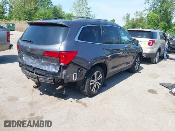2016 Honda Pilot EX-L with VIN 5FNYF6H54GB083139, listed as a IAAI auction lot 42150923 with 213,009 mi miles and . Bid and sale history available at DreamBid. Image 4.