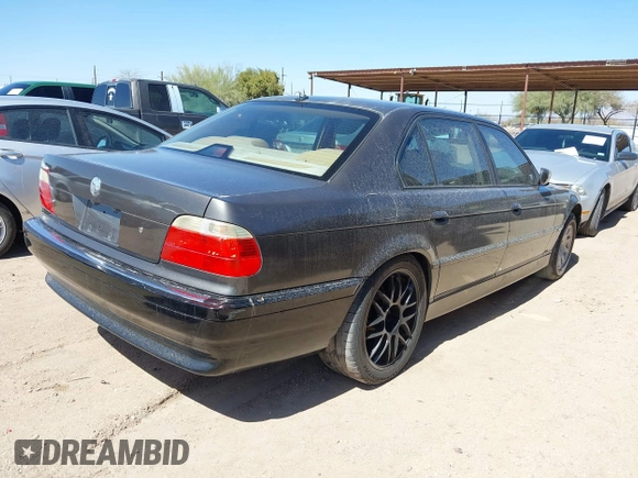 2001 BMW 7 Series 740iL with VIN WBAGH83421DP25417, listed as a IAAI auction lot 41725971 with 165,599 mi miles. Bid and sale history available at carsss.com. Image 4.