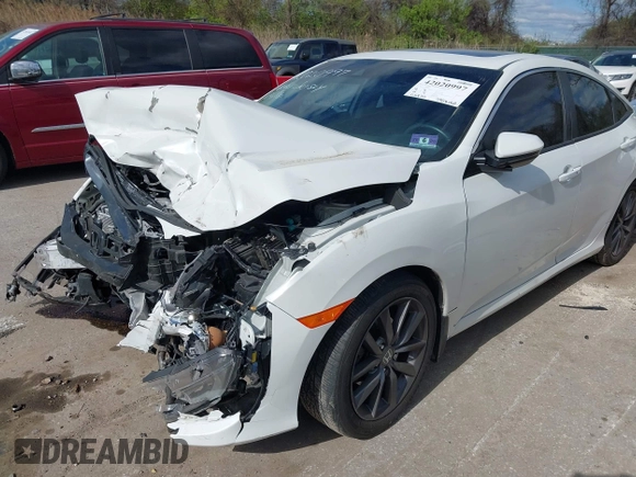 2019 Honda Civic EX z VIN 19XFC1F30KE208186, wystawiony jako IAAI lot #42020997 z przebiegiem 115 430 mil mil oraz . Historia ofert i sprzedaży dostępna na DreamBid. Obrazek 18.