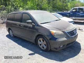 2008 Honda Odyssey Touring z VIN 5FNRL38948B008635, wystawiony jako IAAI lot #42021998 z przebiegiem 141 106 mil mil oraz . Historia ofert i sprzedaży dostępna na DreamBid. Obrazek 1.
