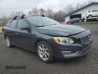 2015 Volvo V60 z VIN YV126MEA6F1206906, wystawiony jako Copart lot #51837425 z przebiegiem 142 194 mil mil oraz Tytuł czysty. Historia ofert i sprzedaży dostępna na DreamBid. Obrazek 4.