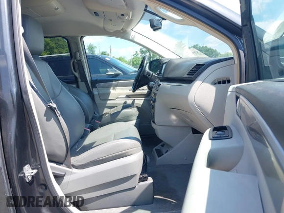 2011 Volkswagen Routan SE with VIN 2V4RW3DGXBR669762, listed as a IAAI auction lot 42693493 with 105,415 mi miles and . Bid and sale history available at DreamBid. Image 5.