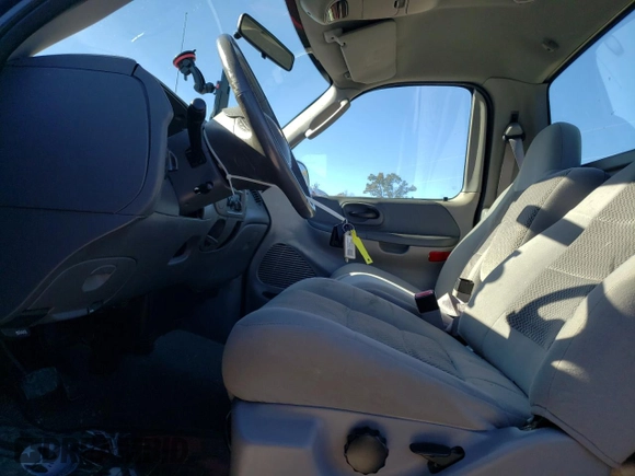 2003 Ford F-150 XL with VIN 1FTRF17L03NB45767, listed as a Copart auction lot 74489053 with 138,263 mi miles and Salvage Title. Bid and sale history available at DreamBid. Image 7.