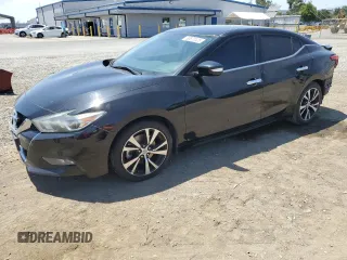 2018 Nissan Maxima SV with VIN 1N4AA6AP1JC377717, listed as a Copart auction lot 60872325 with 163,210 mi miles and Salvage title. Bid and sale history available at DreamBid. Image 1.