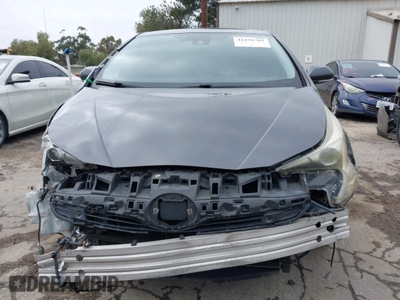 2016 Toyota Prius Four with VIN JTDKARFU8G3015083, listed as a IAAI auction lot 42191765 with 168,820 mi miles and . Bid and sale history available at DreamBid. Image 12.