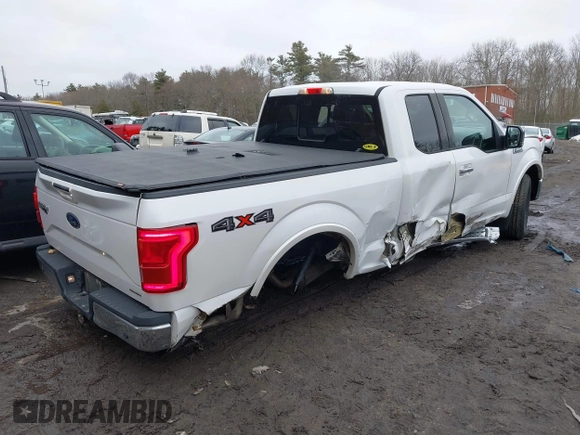 2015 Ford F-150 XLT with VIN 1FTFX1EF5FKD23434, listed as a IAAI auction lot 41613023 with 151,905 mi miles and . Bid and sale history available at DreamBid. Image 4.