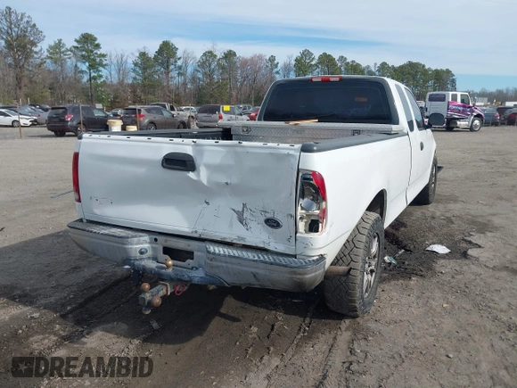 2000 Ford F-150 XL with VIN 1FTRX17LXYNC39983, listed as a IAAI auction lot 41750277 with 170,016 mi miles. Bid and sale history available at carsss.com. Image 4.