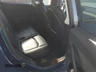 2022 Tesla Model Y Long Range z VIN 7SAYGAEE2NF364733, wystawiony jako IAAI lot #42290231 z przebiegiem 33 907 mil mil oraz . Historia ofert i sprzedaży dostępna na DreamBid. Obrazek 8.