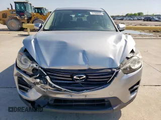 2016 Mazda CX-5 Sport with VIN JM3KE2BY6G0671358, listed as a Copart auction lot 51990095 with 117,763 mi miles and Salvage Title. Bid and sale history available at carsss.com. Image 5.