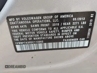 2013 Volkswagen Passat SE w/Sunroof & Nav with VIN 1VWBP7A30DC112563, listed as a IAAI auction lot 41917390 with 222,008 mi miles. Bid and sale history available at carsss.com. Image 9.