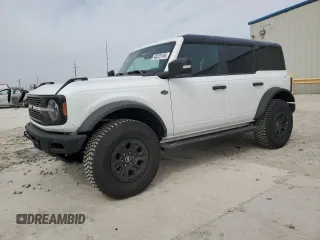 2024 Ford Bronco Wildtrak z VIN 1FMEE2BP6RLB29591, wystawiony jako Copart lot #48225165 z przebiegiem 4466 mil mil oraz Szkody całkowita. Historia ofert i sprzedaży dostępna na DreamBid. Obrazek 1.