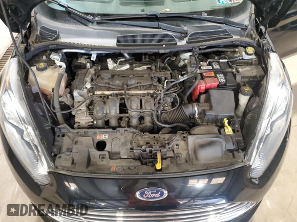 2018 Ford Fiesta S z VIN 3FADP4AJ0JM142347, wystawiony jako Copart lot #62892505 z przebiegiem 41 546 mil mil oraz Szkoda całkowita • Salvage title. Historia ofert i sprzedaży dostępna na DreamBid. Obrazek 11.