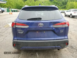 2022 Toyota Corolla Cross XLE with VIN 7MUDAABGXNV042443, listed as a Copart auction lot 57808565 with 102,887 mi miles and Salvage title. Bid and sale history available at DreamBid. Image 6.
