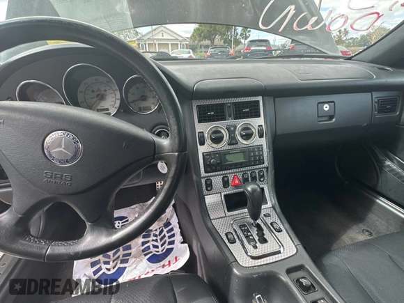 2002 Mercedes-Benz SLK 230 Kompressor with VIN WDBKK49FX2F265220, listed as a Copart auction lot 79324194 with 90,860 mi miles and Clean title. Bid and sale history available at DreamBid. Image 9.