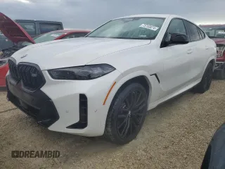 2025 BMW X6 M60i with VIN 5UX43EX07S9X98716, listed as a Copart auction lot 73753074 with 63 mi miles and Salvage Title. Bid and sale history available at carsss.com. Image 1.