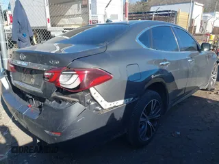 2015 Infiniti Q70 with VIN JN1BY1AR0FM562523, listed as a IAAI auction lot 41310831 with 73,870 mi miles and . Bid and sale history available at DreamBid. Image 4.